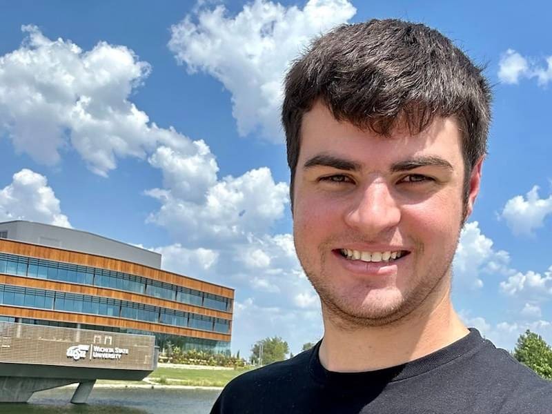 Braden Webb in front of Woolsey Hall