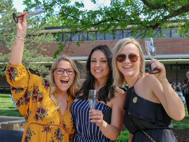 Students celebrating at The Toast