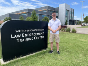 Carter Duff standing outside the Wichita-Sedgwick County Law Enforcement Training Center