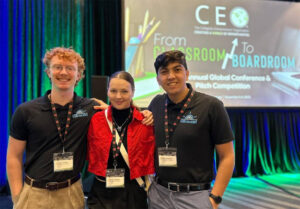 James Wright stands with how teammates in the ViBracelet team, who competed at the Collegiate Entrepreneurs’ Organization Global Pitch Conference