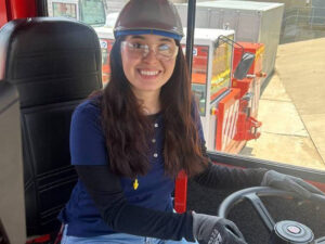 Janett Lerma-Reyes operates equipment during her summer internship at Shuttlewagon in Kansas City