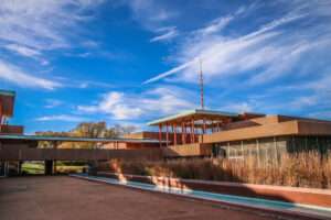 Landscape image of Corbin Education Building with blue sky