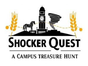 The image is a logo for "Shocker Quest," a campus treasure hunt. The design is in black and gold, with the background being white.  The logo is centered around a stylized image of a campus building that looks like a clock tower. To the left of the building is a stylized horse statue, and to the right is a tornado. An arched, dotted line connects two stalks of wheat on either side of the central design, passing behind the clock tower and the tornado. The two stalks of wheat are colored gold.  Below the main image, the words "Shocker Quest" are written in a large, bold, black font, with a horizontal line drawn beneath it. Below this line, in a smaller font, are the words "A CAMPUS TREASURE HUNT."