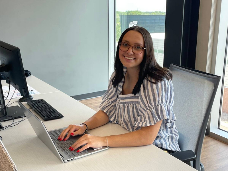 Gabey Norris working at her internship at the Midwest Criminal Justice Institute at Wichita State