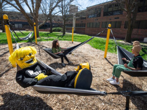 WuShock relaxes at the Hammock Lounge with students