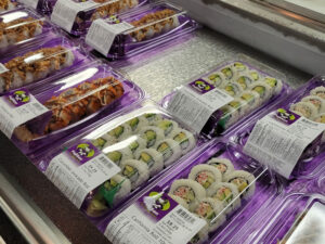 A mix of pre-packed sushi options from FujiSan, including California rolls, tempura rolls and more