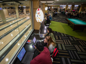 Students mingle at the Shocker Sports Grill & Lanes in-between classes