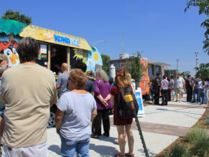 Students, faculty, staff and community members gather at the Food Truck Plaza on campus