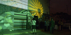 Attendees visit an art installation in Wichita