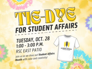 Colorful flyer with tie-dye background promoting a "Tie-Dye for Student Affairs" event. Large yellow and black text at the top reads "TIE-DYE FOR STUDENT AFFAIRS." Below, black text states: "Tuesday, Oct. 28, 1:00 – 3:00 p.m., RSC East Patio." Smaller text at the bottom reads: "Join us as we close out Student Affairs Month with color and creativity!" On the right side, there is an illustration of a white T-shirt with the Wichita State University Student Affairs logo. The background features vibrant tie-dye splashes in yellow, pink, green, and blue.