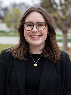 Rory Mata's headshot in the outdoors.