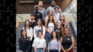Group of students participating in IMPACT on the social stairs in Woolsey Hall.