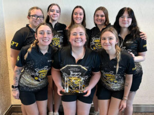 Shocker women's bowling poses with their Track Kat Klash trophy