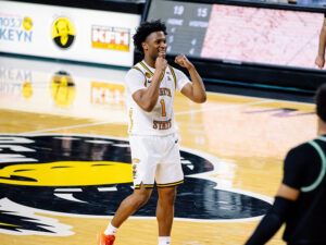 Kenyon Giles Fist Pumps at a Recent Men's Basketball Game
