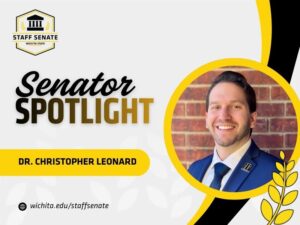 Staff Senate Wichita State Logo on top left corner. Senator Spotlight in bolded text in the middle, with Dr. Christopher Leonard written underneath it. A link to wichita.edu/staffsenate at the bottom left corner. Photo of the senator in the middle right of the page with black and yellow graphic wheat designs.