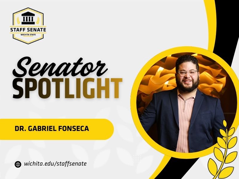 Staff Senate Wichita State Logo on top left corner. Senator Spotlight in bolded text in the middle, with Dr. Gabriel Fonseca underneath it. A link to wichita.edu/staffsenate at the bottom left corner. Dr. Gabriel Fonseca photo in the middle right of the page with black and yellow graphic wheat designs.