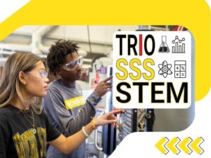 Students with safety goggles pushing buttons on a machine. TRIO SSS STEM logo.