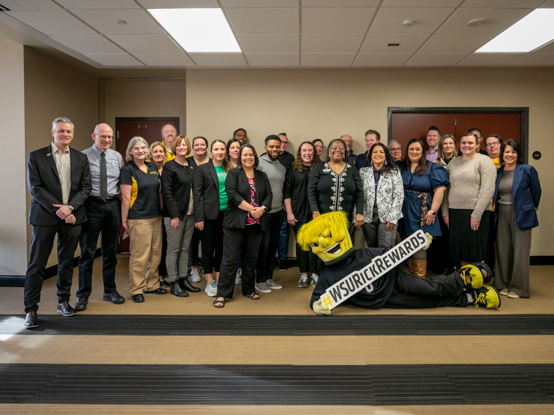 President Rick Muma and WuShock pose with members of the SSP Coalition for Rick Rewards.