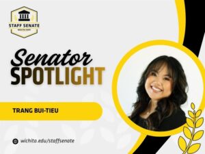 Staff Senate Wichita State Logo on top left corner. Senator Spotlight in bolded text in the middle, with Trang Bui-Tieu written underneath it. A link to wichita.edu/staffsenate at the bottom left corner. Photo of the senator in the middle right of the page with black and yellow graphic wheat designs.
