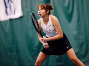 Vichitraporn Vimuktananda stands ready to return a serve