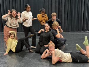 Student actors perform in an improv production