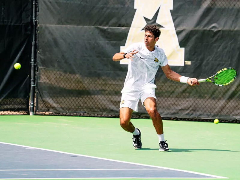 Al Mashni prepares to hit a serve back at his opponent during a set