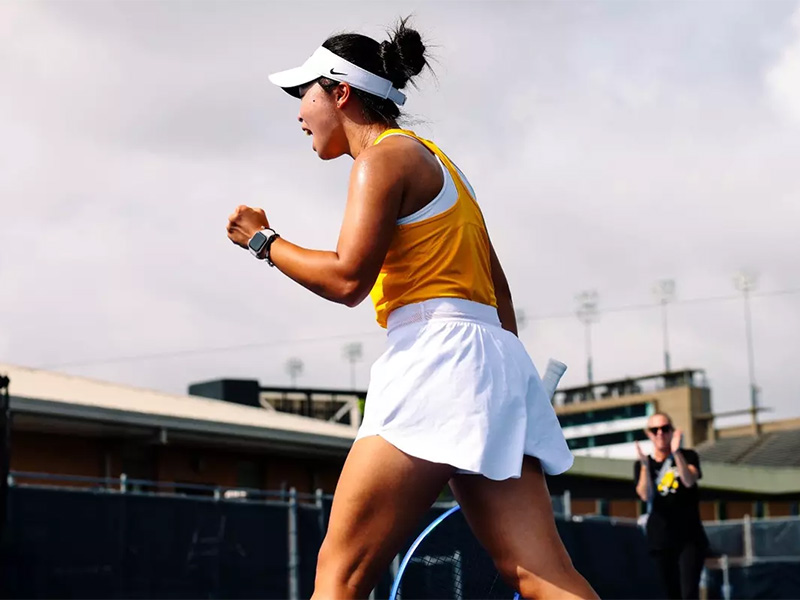 Xin Tong Wang celebrates after a successful set