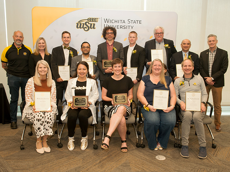 Faculty who were recognized at the University Faculty Awards pose with President Rick Muma, Provost Monica Lounsbery and Faculty Senate President Chris Stone