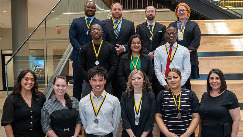 Teams that Placed at the Barton School's Interdisciplinary Business Challenge on the social stairs