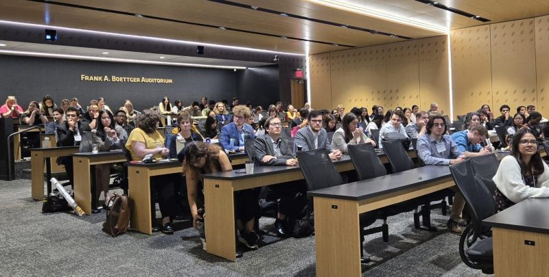 Large group of students sit at the Woolsey Hall Auditorium moments before the beginning of the awards ceremony.