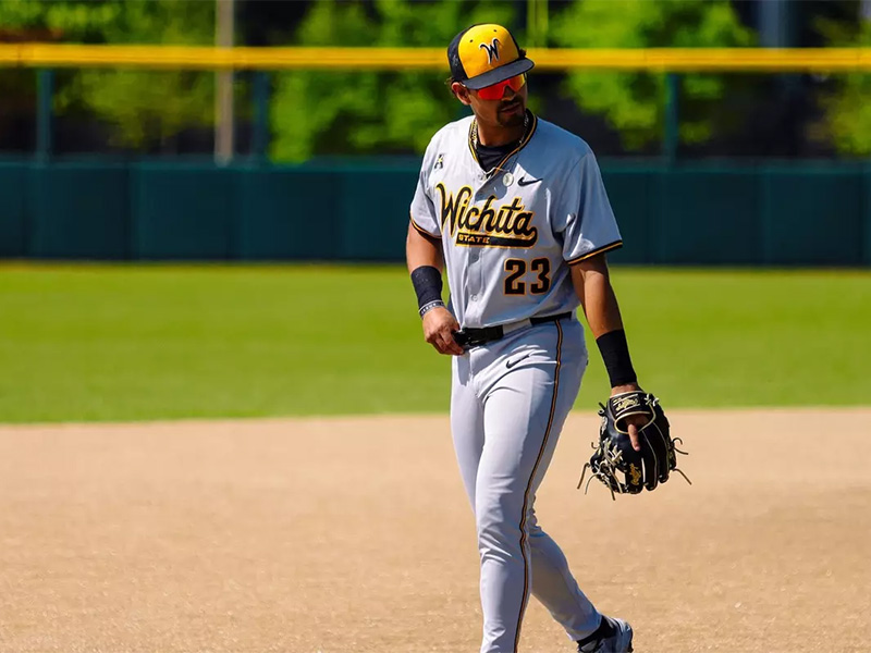 Jayson Jones on the field at Eck Stadium in Shocker gear