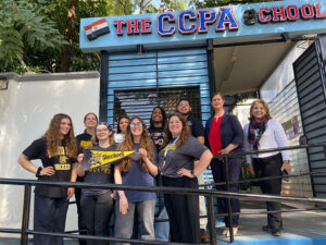 Students pose in front of the CCPA School in Paraguay