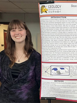 Elizabeth Small with poster.