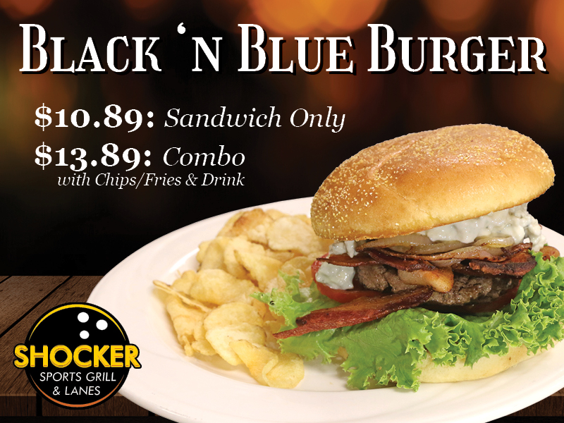 Black 'N Blue Burger. Burger patty topped with Blue cheese mix, applewood smoked bacon, sauteed onion, lettuce and tomato, server on a kaiser roll bun.