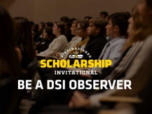 Distinguished Scholarship Invitational. Be a DSI Observer. Students are sitting in an auditorium during the DSI welcome session from last year.
