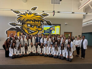 Physician Associate Program Class of 2028 with President Richard Muma
