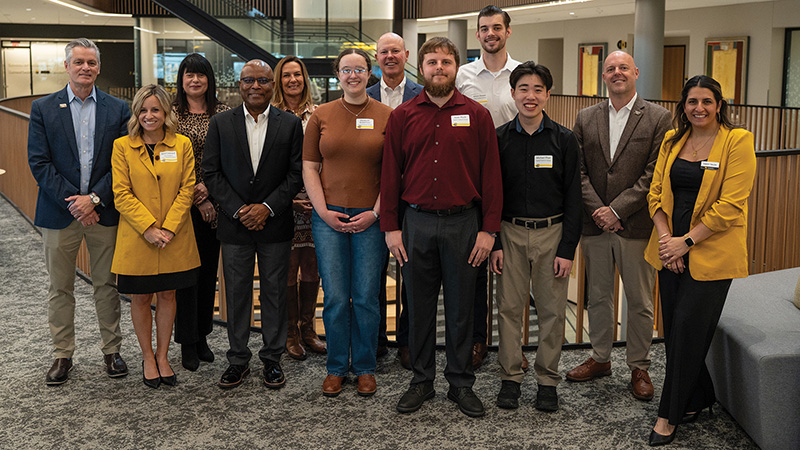 Capital Federal Scholars pose with Wichita State leadership and team members.